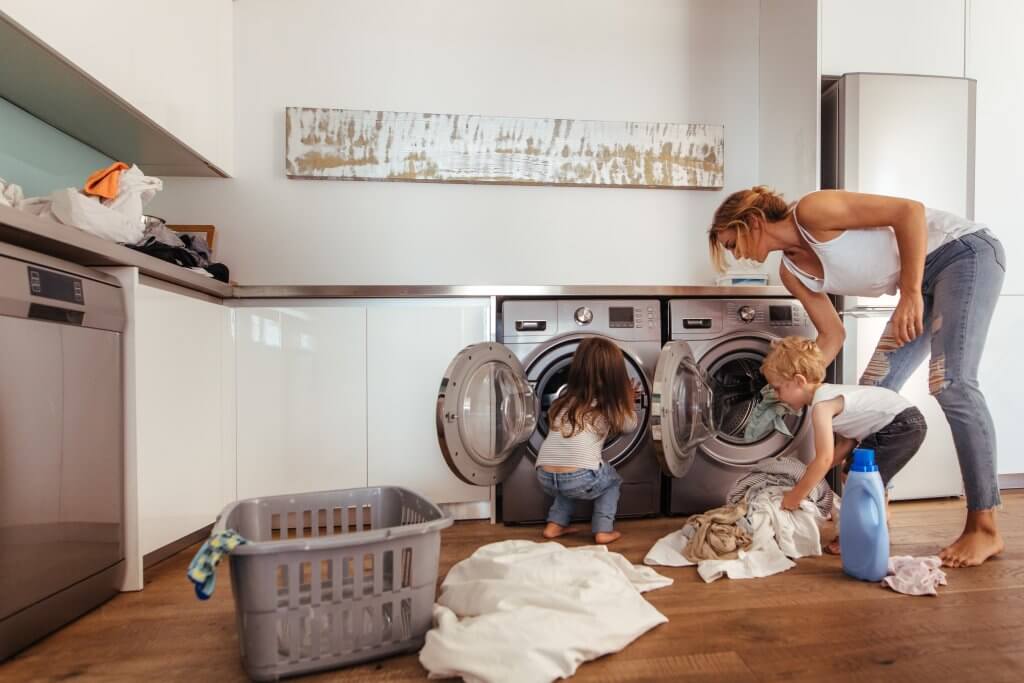 family doing laundry together