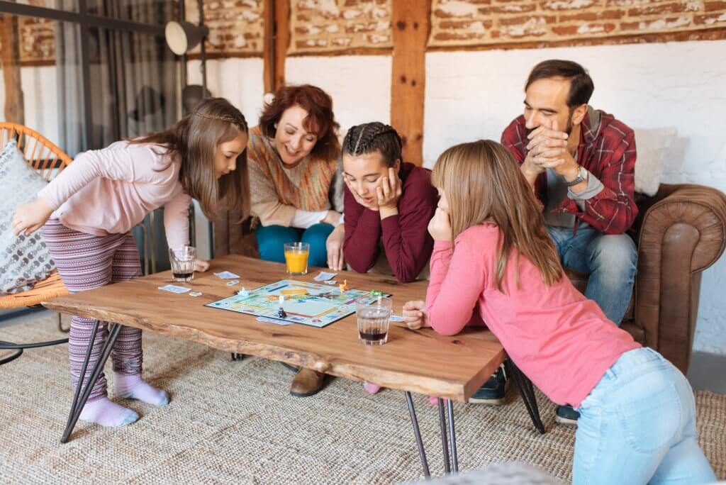 family playing a board game