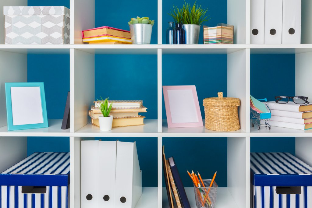 cube organizer with various items displayed on the shelves