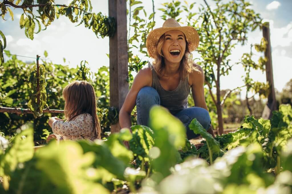 woman laughing in garden