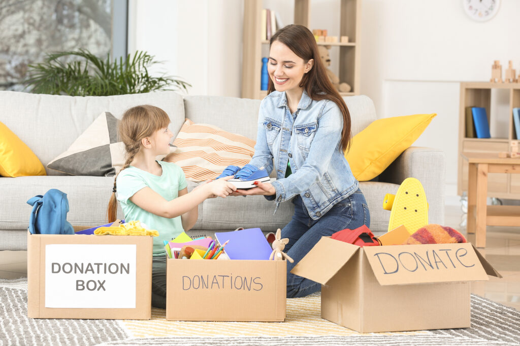 daughter and mother sorting donations