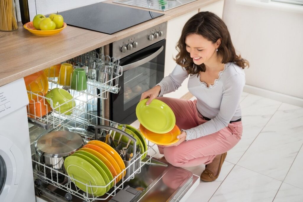 emptying dishwasher
