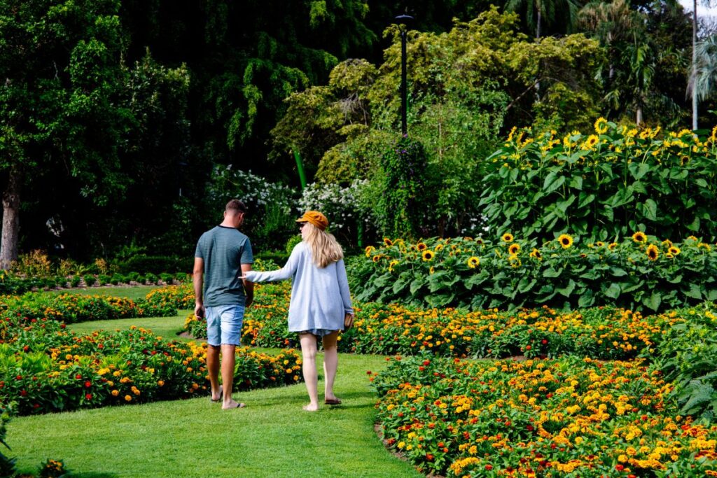 couple walking in garden