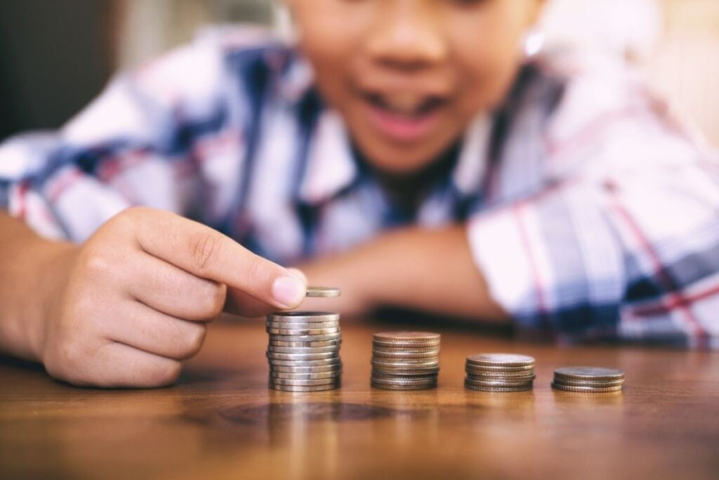 child counting money