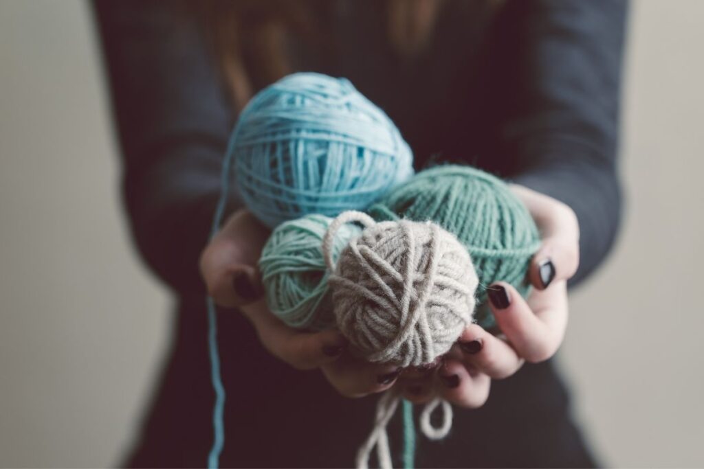 woman holding yarn