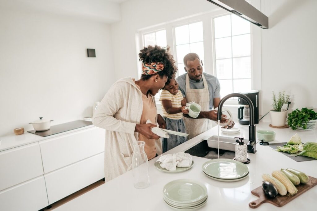 family cleaning kitchen