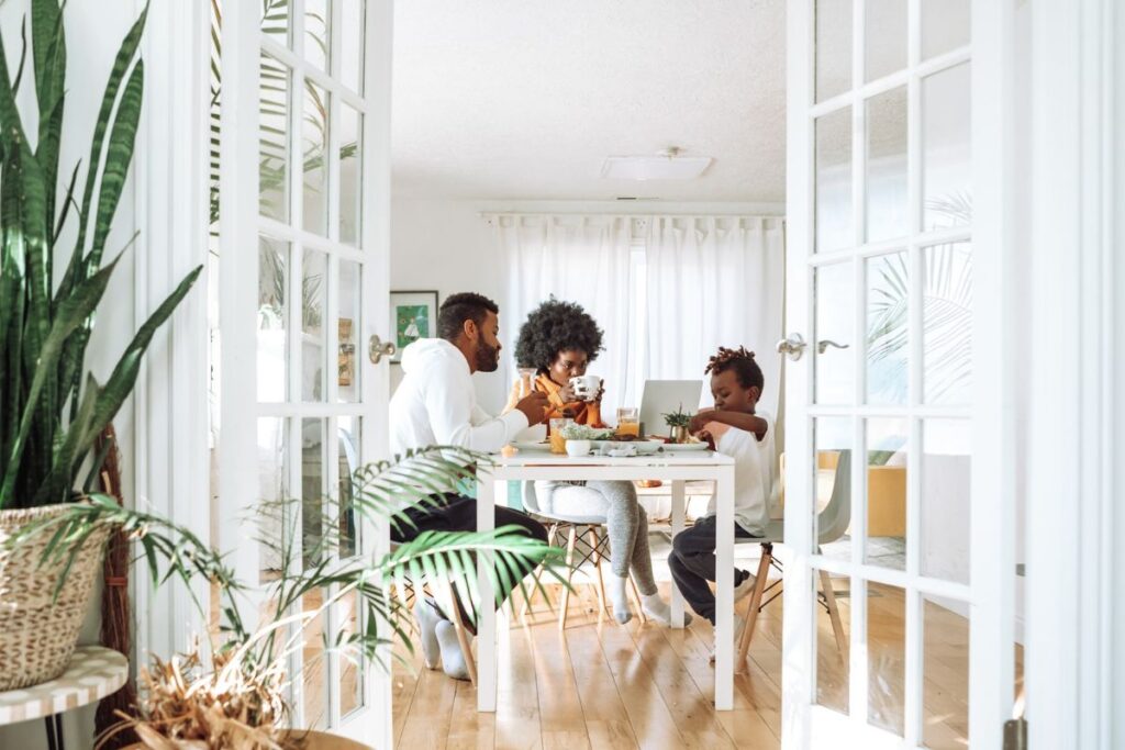 family sitting at the kitchen table