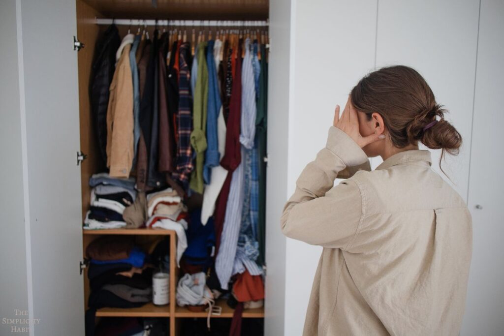 woman looking in closet