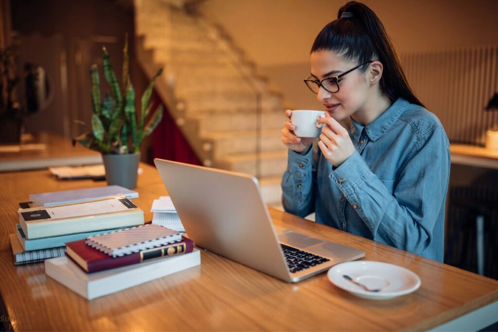 focused woman looking at computer