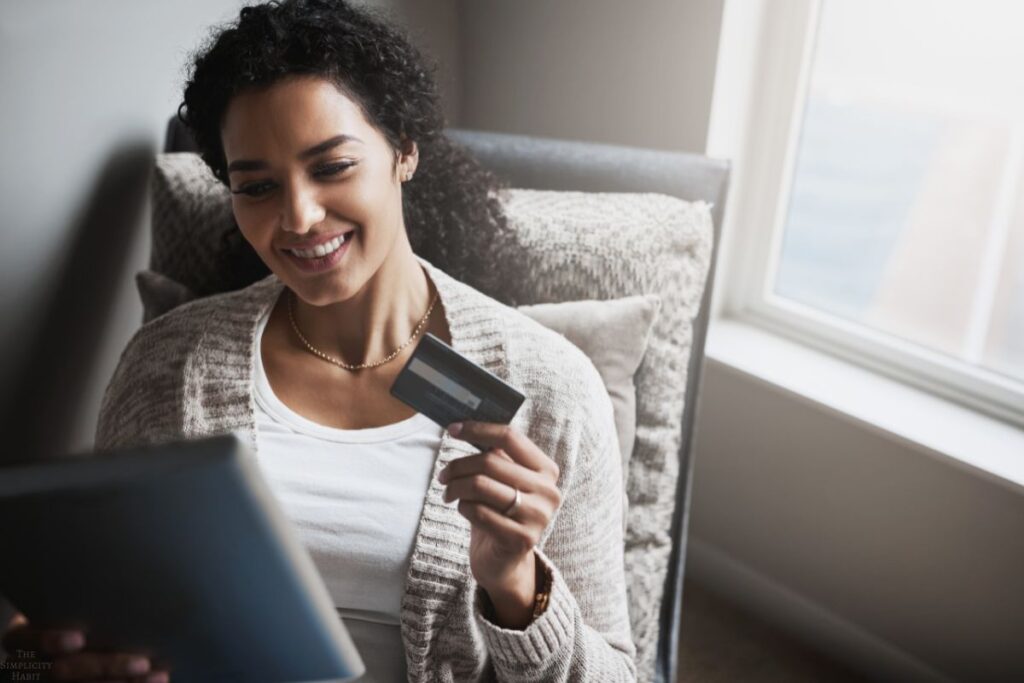 woman holding a credit card