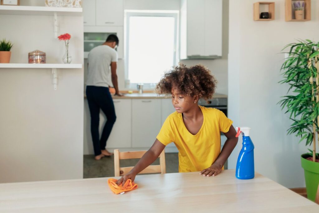 family helping with cleaning tasks