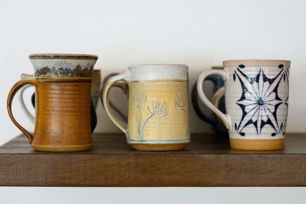 mugs on a shelf