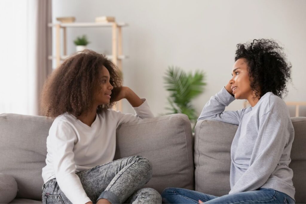 mother and daughter talking and listening