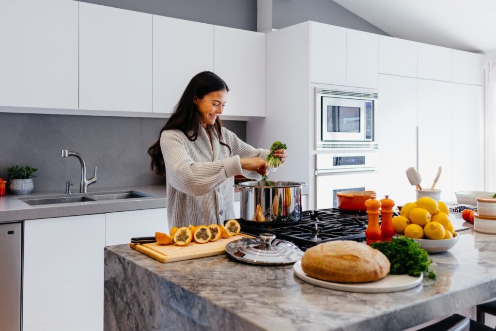 woman cooking in her kitchen