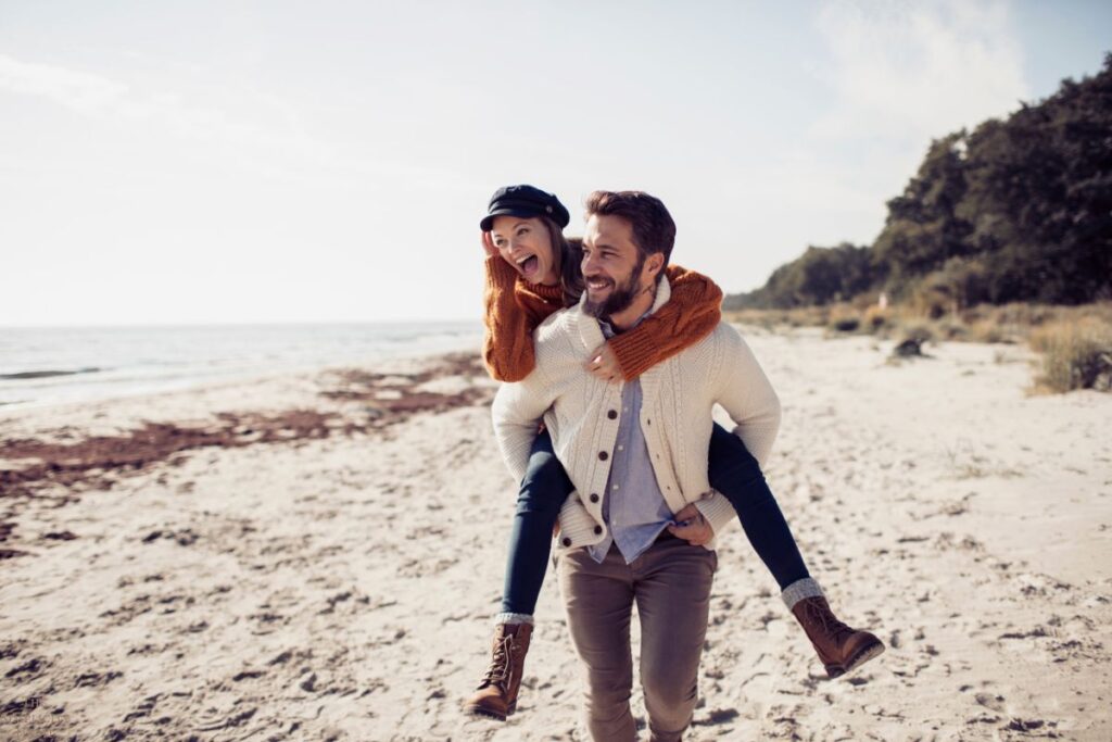 happy couple at the beach