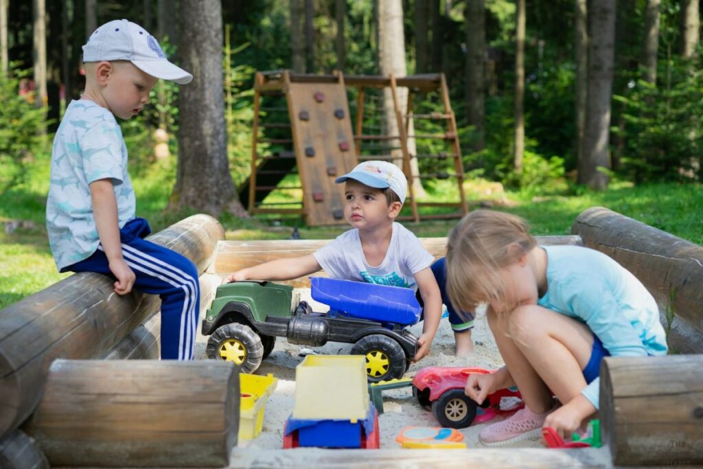 children playing in a sandbox