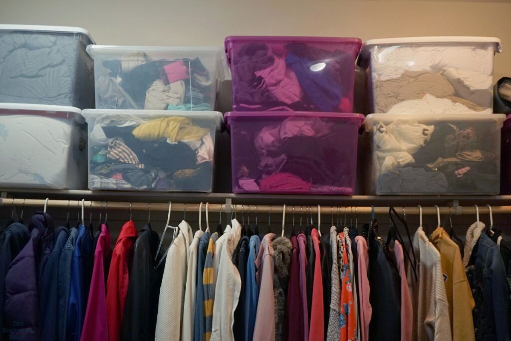 bins on the top shelf in closet