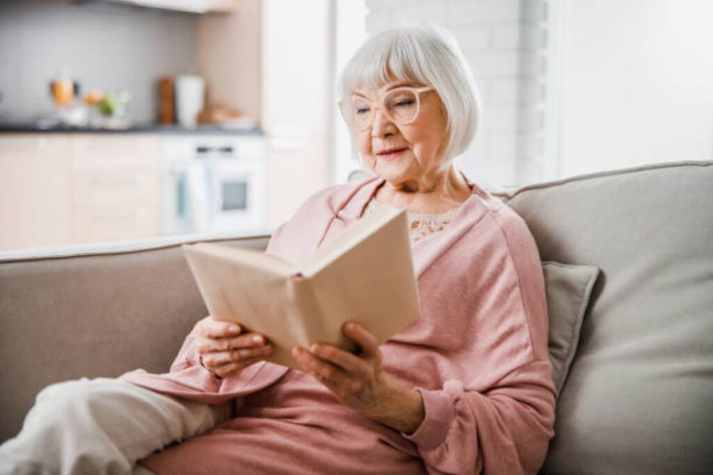 senior woman reading a book