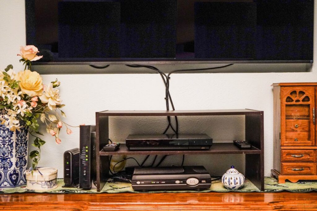 cords behind entertainment center