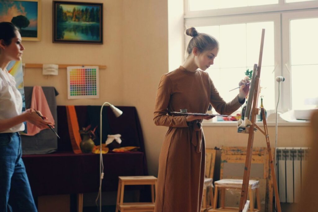 woman painting in an art studio